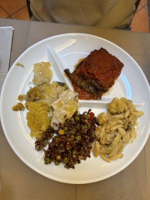 Parmigiana flora, potato gratin, pasta with potatoes, rice with peas  at Flora in Verona