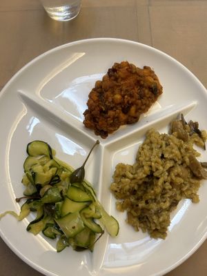Risotto with mushrooms, mix of legumes, zucchini with capers and olives  at Flora in Verona