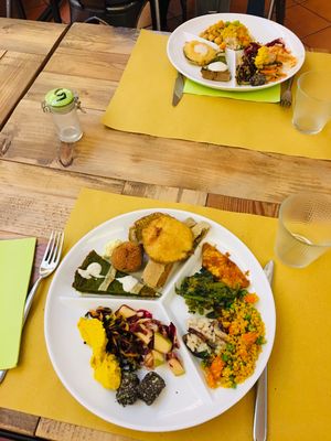 Food is selected from a plentiful buffé table and weighed.  at Flora in Verona