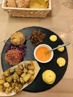 « Bis Burger » , both patties are prepared with exquisite mix of legumes and gluten-free cereals coming with caramelized onions and home made turmeric mayonaise!  at Flora in Verona