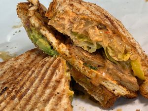 #87 Andrew 3000: Blackened Tofu, Caramelized Onions,
Avocado, Banana Peppers, Vegan Bacon, Tomatoes, Chipotle
Veganaise, Romaine, 9-Grain wheat at Two Beards Deli in Grand Rapids