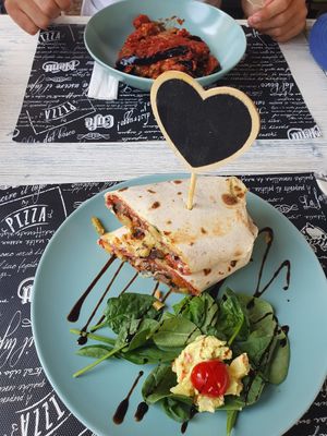 Vegan wrap and parmigiana at Feliz Cafe in Peschiera Del Garda