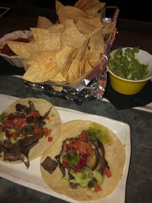 Portobello tacos, chips, salsa and guac. at Hatch Taqueria and Tequila  in Jackson
