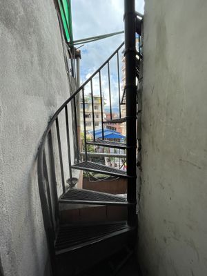 The stairs to get to the rooftop   at Loving Heart in Kathmandu