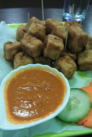 Tofu pakoda - fried tofu with corn flour and sesame seeds at Loving Heart in Kathmandu
