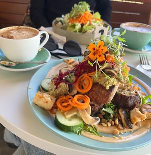 Chai Latte, Banh Mi Bruschetta (Background: Caesar Salad, Cappuccino)  at Flora and Fauna in Fremantle