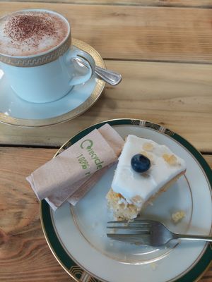 Hot chocolate and lemon cake at Oats Healthy Living Store in Brixham