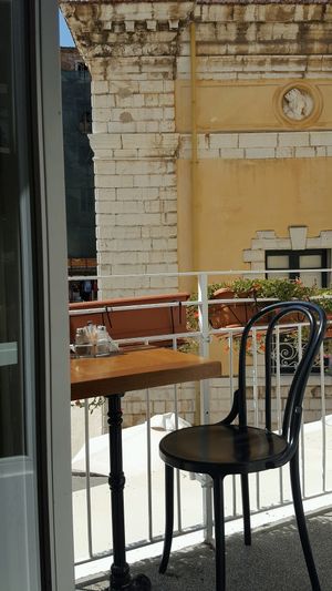 seating on the balcony at Pane e Souvlaki in Corfu