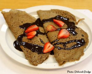 Buckwheat crepes - this is our Sweet Crepe - filled with fresh strawberries and a chocolate sauce on top. at 7th Element in Burbank