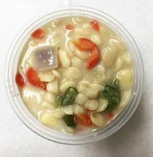 Baby lima bean stew with red & green bell peppers, red onion, miso and tahini.  at 7th Element in Burbank