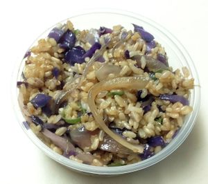 Brown rice stir fry with red cabbage, Vidalia onions, scallions and tamari. at 7th Element in Burbank