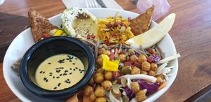 Tempeh roasted chickpeas with avo, kimchi cashews, soba with tumeric tahini dressing at Foraged in Seddon
