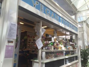 side of stall with entrance into store  at Vegan Store Stall 83 in Rome