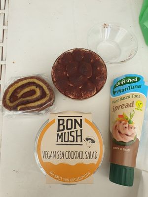 Chocolate orange swiss roll, Tiramisu, cocktail salad, "tuna" spread at Vegan Store Stall 83 in Rome