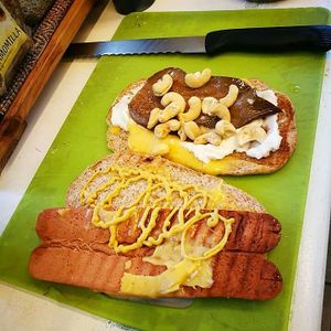 Preparing sandwich at Vegan Store Stall 83 in Rome
