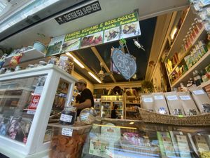 Store front from outside & dessert window at Vegan Store Stall 83 in Rome