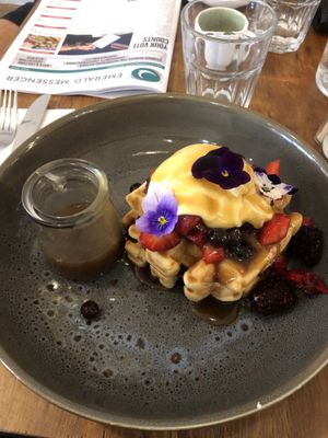 Vegan waffles w/ fresh berries, butterscotch & cream. $19 at The Laughing Owl in Belgrave