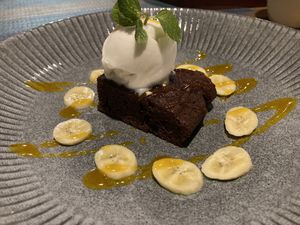 Vegan brownie with coconut sorbet and mango sauce  at Banlle in Siem Reap