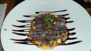 Rhum chocolate mousse with tropical fruit salad at Banlle in Siem Reap