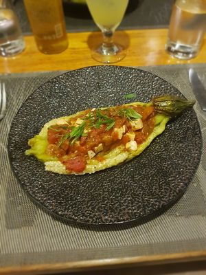 Grilled egplant with tomato, soft tofu and herbs at Banlle in Siem Reap