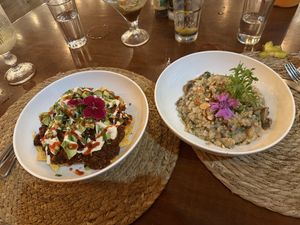 Chilaquiles (left) was one of the best dishes. Risotto was just ok (right)  at Organico Fortuna in La Fortuna