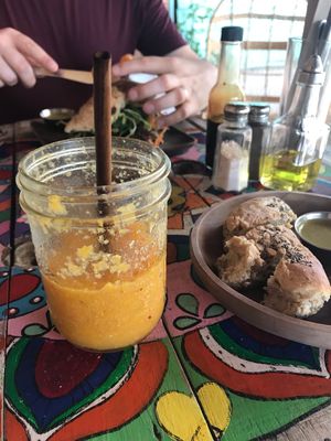 Smoothie, side of bread, and green volcano sandwich  at Organico Fortuna in La Fortuna
