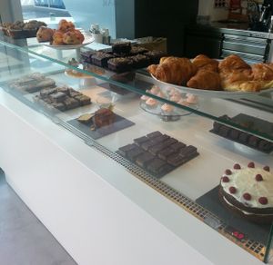 Cake/pastry selection, the brownie on the top shelf was black bean and coconut! at Pure Boutique Cafe in Quinta Do Lago
