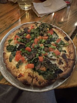 The Terra firma with GF crust and vegan mozzarella. One of the best pizzas I have ever eaten! Was like a white clam pizza!   at Red Tractor Pizza in Bozeman
