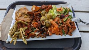 Large plate with a huge variety of foods at Sattgrün in Essen