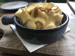 Loaded breakfast yuca at Bar Bombon in Philadelphia