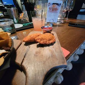 PHILLY STEAK EMPANADAS  housemade 'cheese’, corn, pico de gallo, spicy ketchup at Bar Bombon in Philadelphia