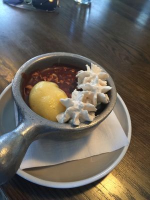 This was a layer custard that the server Dan gave me in placed of the Tres Leches I ordered. it was bomb. it's like coconut cream with hazelnut chocolate. passion fruit foam. and coco whip. I am so grateful he did that for me since I have asked the bartender and he said I couldn't swap my dessert. So great customer service from Dan. he def. earned the 5 stars. Thank you! :-)  at Bar Bombon in Philadelphia