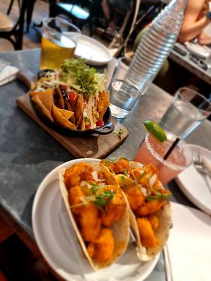 Nachos & Buffalo cauliflower tacos  at Bar Bombon in Philadelphia