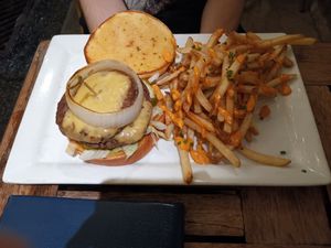 Chorizo burger with a side of cheese fries. at Bar Bombon in Philadelphia