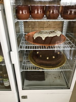 Dessert fridge (chocolate mousse, carrot cake, chocolate torte, banana loaf at La Libelula Vegan Cafe in Fuengirola