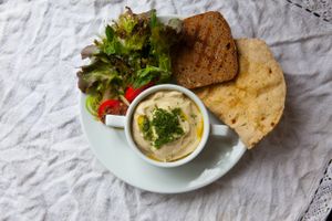 We make hummus fresh, after your order, with siberian pine nuts and home made tahina , our famost home made low gluten bread and pita )) at Harmony in Koh Phangan