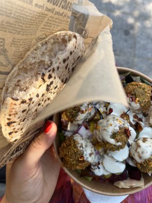 Falafel bowl and bread. at Falafel Vegano - Food Stall in Barcelona