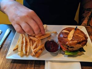 Beyond burger on pretzel bun at Full Bloom in Miami Beach