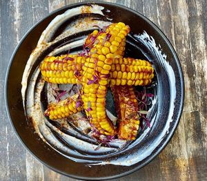 Corn Ribs Tossed with chili lime, bbq sauce, garlic cream and micro amaranth

#VeganMenu
#GourmetVeganCuisine at Full Bloom in Miami Beach