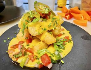Loaded Yuca Fries - Crispy yuca, cheese sauce, pico de gallo, avocado, fermented jalapeño & spicy mayo

#YucaFries #LunchMenu
#FullBloomVegan
#GourmetVeganCuisine at Full Bloom in Miami Beach
