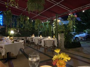 Outdoor tables at Full Bloom in Miami Beach