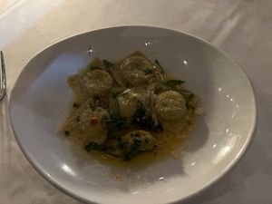 Ravioli Della Casa with Vegan Herbs Butter Sauce at Full Bloom in Miami Beach