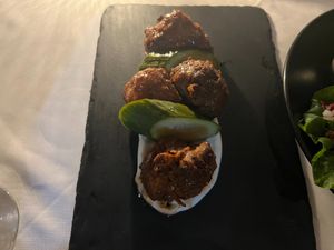 Yakiton: Lion mane mushrooms skewers, teriyaki glaze, togarashi & pickled dikon at Full Bloom in Miami Beach