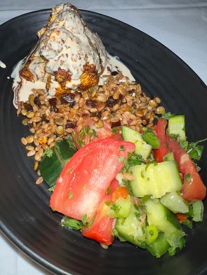 Cauliflower with a tahini sauce, yummy grains and a Mediterranean salad  at Full Bloom in Miami Beach