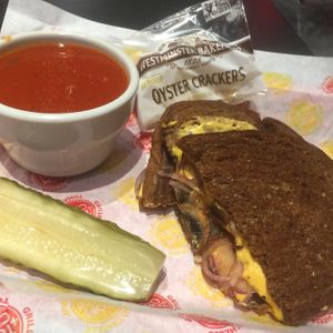 vegan Swiss & shroom grilled cheese w vegan tomato soup at Tom + Chee in Evansville