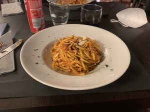 Pasta (fresh) with pesto. I’m the background there’s the vegan version with integral pasta.  at Pasta and Social in Rome