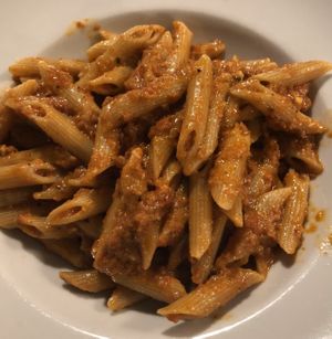 Penne pasta with sun dried tomato pesto at Pasta and Social in Rome