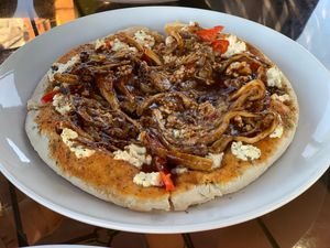 Vegan pizza with mushrooms and vegan cheese.  at SoyGreen in San Salvador