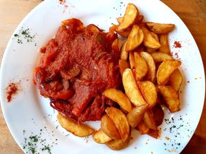 Soy schnitzel Hungarian style with wedges at Ronja in Muelheim
