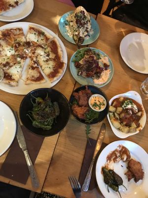 pizza and chicken not vegan- padron peppers, hispi cabbage, sweet potato fritters, patatas bravas  at Under the Stars  in Bristol